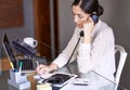 Woman, desk and laptop with telephone, notepad and writing for call with communication and work. Secretary, workspace Royalty Free Stock Photo