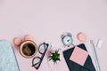 Woman Desk on pink glasses notepad kicking pencils plant macaroons alarm clock Top View Space For Text