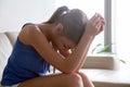 Woman in despair through divorce sitting with ring Royalty Free Stock Photo