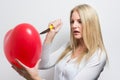 Woman destroying heart Royalty Free Stock Photo