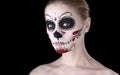 Woman with dia de los muertos makeup, black empty space. Royalty Free Stock Photo