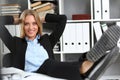 Woman director is resting and dreaming at work Royalty Free Stock Photo