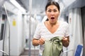 Woman discovered theft in subway train Royalty Free Stock Photo