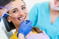 Woman discussing dental bleaching with her dentist Royalty Free Stock Photo