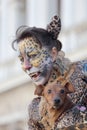 Woman disguised as a leopard during the Carnival of Venice