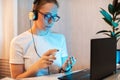 Woman disinfects the surface of the phone