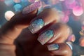A woman displaying her nails with glittery gradient design, sparkling in the light, Glittery gradient nails that sparkle in the Royalty Free Stock Photo