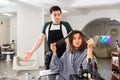 Woman displeased with new haircut in hairsalon