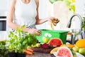 Woman disposing of leftovers Royalty Free Stock Photo