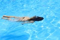 Woman diving underwater