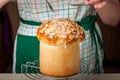 A Woman Dizzling Easter Bread with Sugar Icing Royalty Free Stock Photo