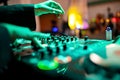 DJ Hands creating and regulating music on dj console mixer in concert