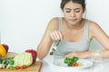 Woman do not want to eat vegetables and dislike taste of broccoli Royalty Free Stock Photo