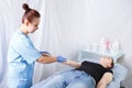 A woman doctor doing a woman`s right hand massage, patient Royalty Free Stock Photo