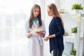 Woman doctor explaining diagnosis prescribe to her Royalty Free Stock Photo