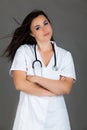 Woman doctor on grey background medical staff personell nurse Royalty Free Stock Photo