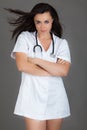 Woman doctor on grey background medical staff personell nurse Royalty Free Stock Photo