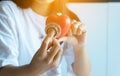 Woman doctor hands holding stethoscope to checking red heart from patient,Health care checking concept Royalty Free Stock Photo