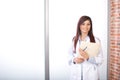 Woman doctor holding a chart Royalty Free Stock Photo