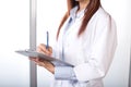 Woman doctor holding a chart Royalty Free Stock Photo