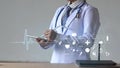 Woman doctor holding digital pencil and touching screen on smart device