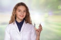 Woman doctor holding a glass of clean water and smiling Royalty Free Stock Photo