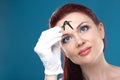 Woman doctor holds tweezers of medical leeches. Hirudotherapy, Hirudo medicinalis. Alternative medicine, bloodletting and