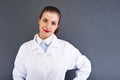 Woman Doctor over dark background Royalty Free Stock Photo