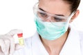 Woman doctor scientist researcher holds test tube with coronavirus virus analysis medicine to fight covid-19 epidemic Royalty Free Stock Photo