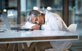 Woman doctor sleeping at desk in overtime medical office, late hospital and burnout. Stress, night and healthcare worker Royalty Free Stock Photo