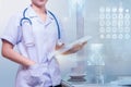 Woman doctor standing in working room