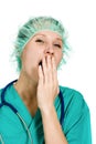 Woman doctor tired yawning