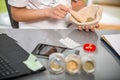 Woman doctor using a mortar and pestle Royalty Free Stock Photo