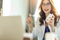 Woman doctor visit,telemedicine healthcare concept,young female doctor giving advice over laptop computer .she using laptop to get Royalty Free Stock Photo