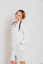 woman doctor in white coat with phonendoscope stethoscope in hospital Royalty Free Stock Photo