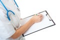 Woman doctor writing on blank clipboard on white background