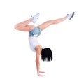 Woman does a gymnastic handstand Royalty Free Stock Photo