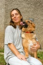 Woman with dog at the animal shelter of Lugano, Switzerland