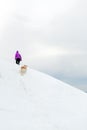 Woman and dog hiking, Karkonosze Mountains, Poland Royalty Free Stock Photo