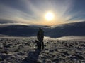 Woman and dog hiking in the mountains Royalty Free Stock Photo