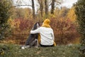 woman and dog husky seating and having fun together Royalty Free Stock Photo