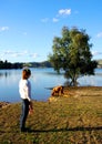 Woman and dog at Lake Eildon Royalty Free Stock Photo