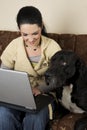 Woman and dog with laptop