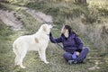 Woman with dog mastiff Royalty Free Stock Photo