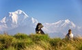 Woman and dog at Poon Hill in Himalayas Royalty Free Stock Photo