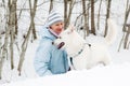 Woman with a dog in winter on walk Royalty Free Stock Photo