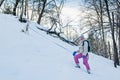 Woman with a dog in winter on walk Royalty Free Stock Photo