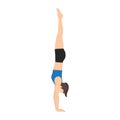 Woman doing Adho Mukha vrksasana or handstand pose yoga exercise