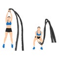 Woman doing battle rope double arm slams exercise