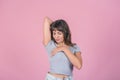 Woman doing a Breast Self-Exam over pink background Royalty Free Stock Photo
